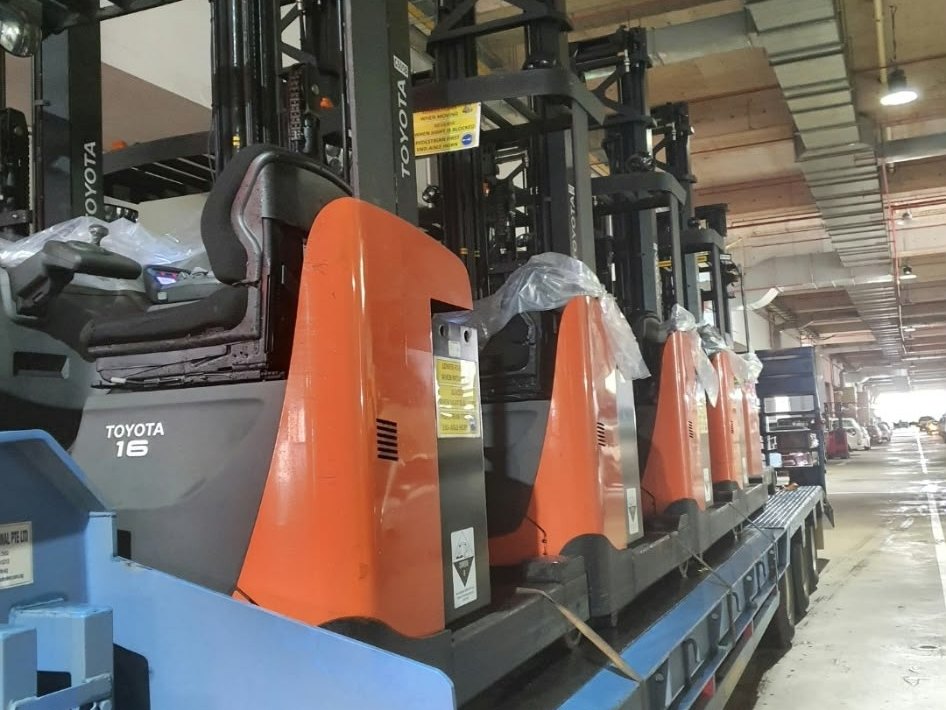 Toyota reach trucks in a warehouse