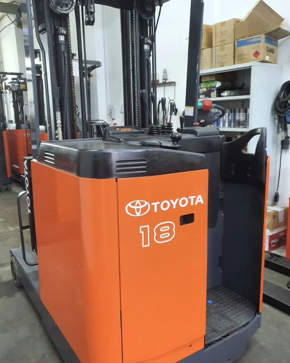 The same Toyota reach truck after overhaul and respray