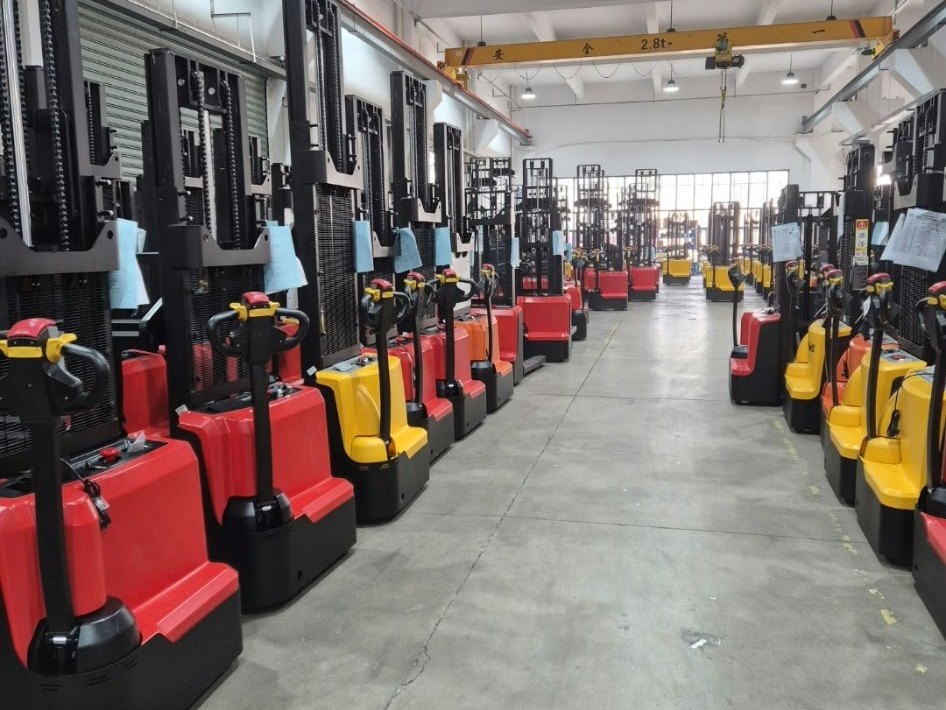 A row of forklifts ready for sale in the Merah workshop